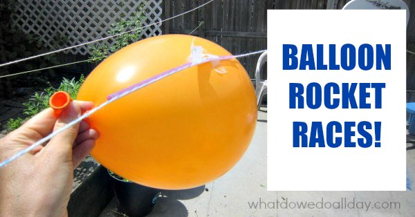 Hand holding orange balloon attached to string in backyard for a balloon rocket experiment with text overlay, "Balloon rocket races!"