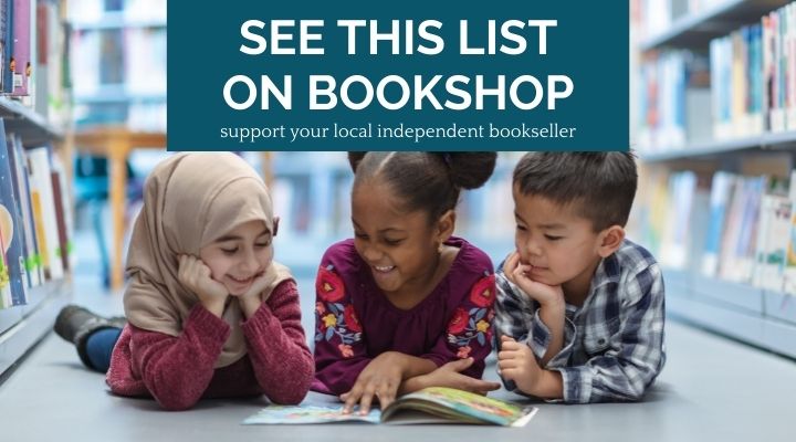 Three children reading a book