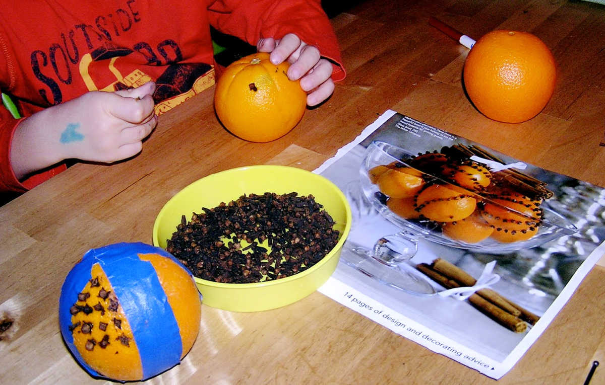 Tablescape with pomander making in progress. 